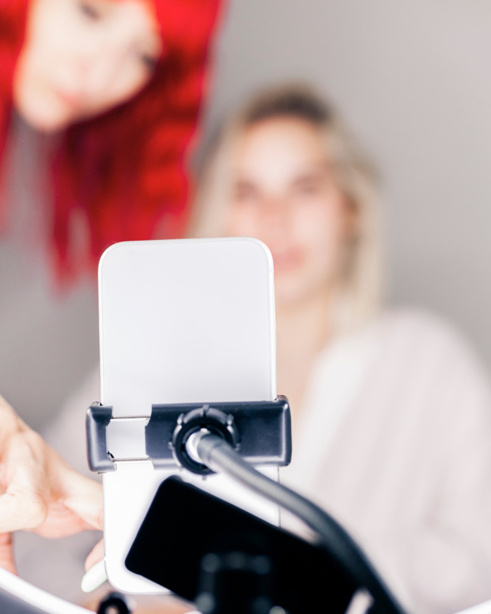 woman in mirror on phone